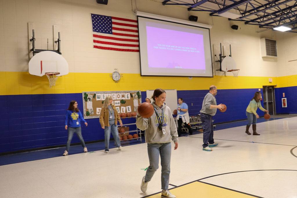 O.M. Tiffany teachers competing in a basketball game