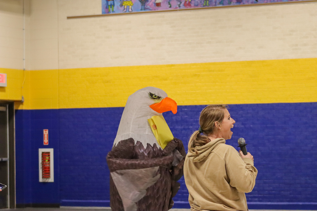 Two O.M. Tiffany teachers - on dressed as an eagle.