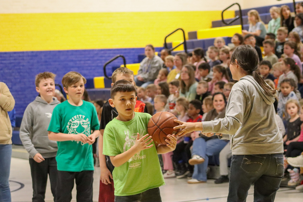 O.M. Tiffany students competing in a basketball game