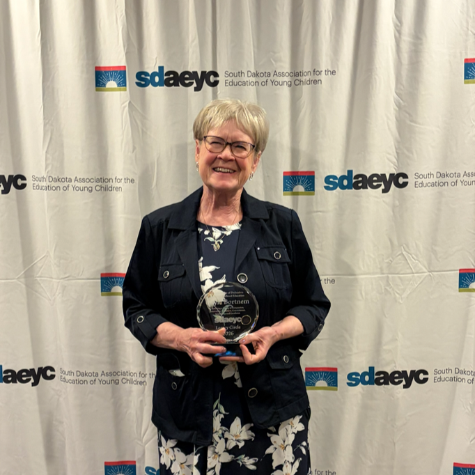 Dr. Gayle Bortnem with her award