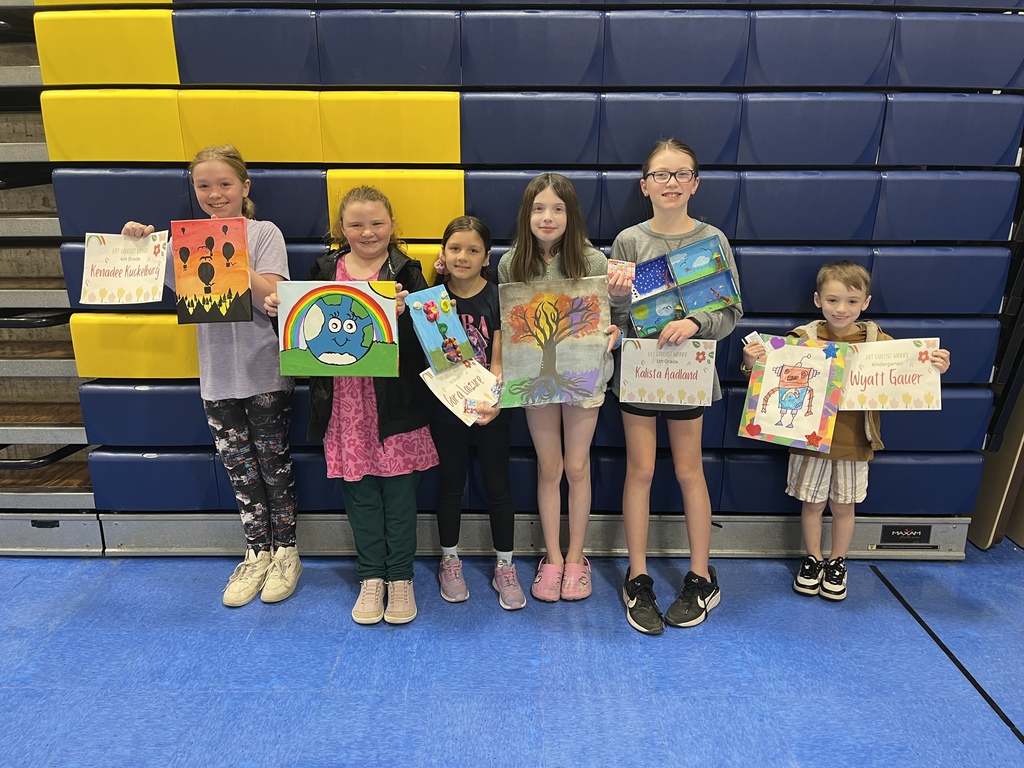 May Overby students with their winning artwork