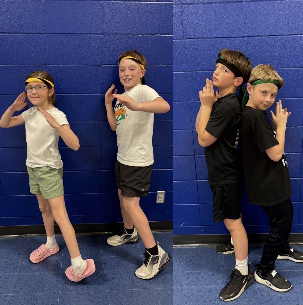 Olivia & Tate (black & yellow belts) with Hayden & Ben (Black and Green Belts) 