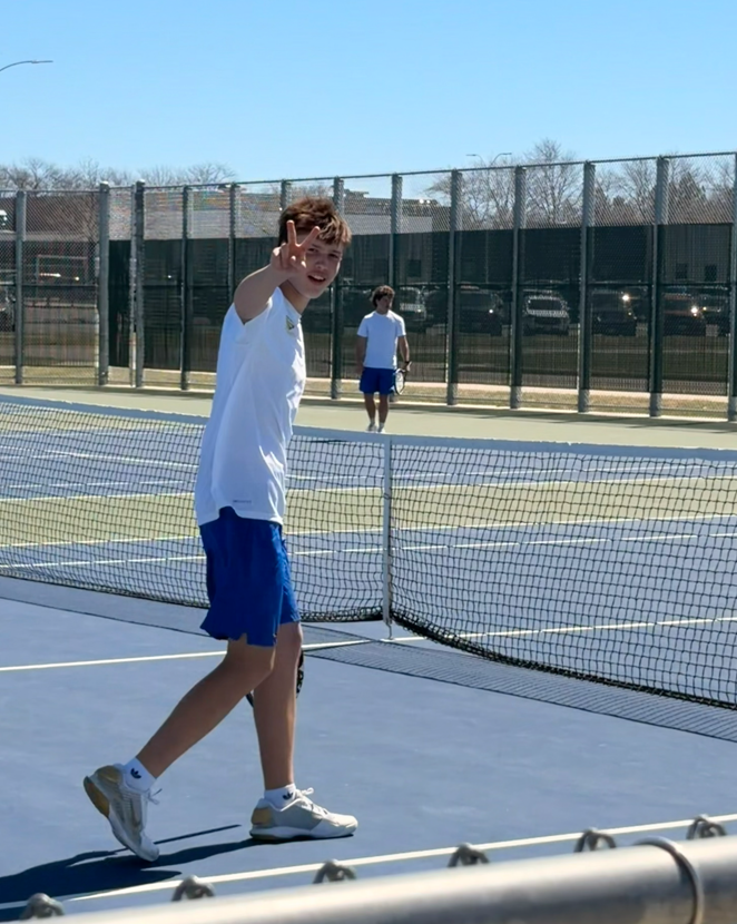 CHS Tennis Player playing at Huron Meet