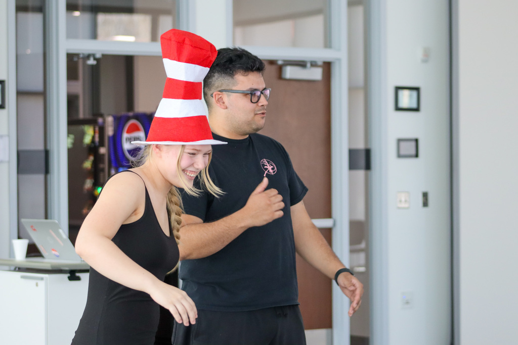 CHS actors helping students at an acting workshop at the library