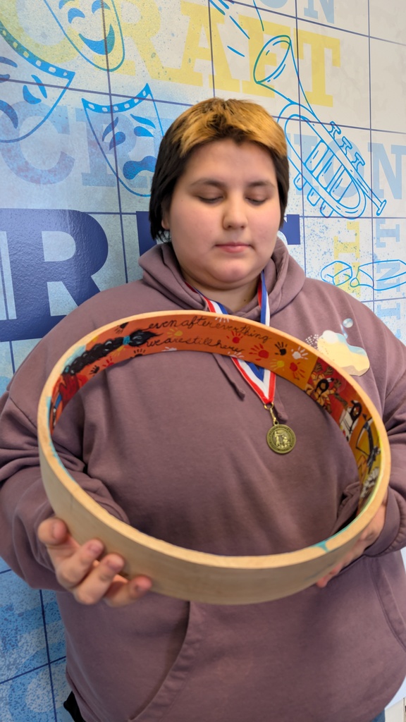 Central student with her artwork