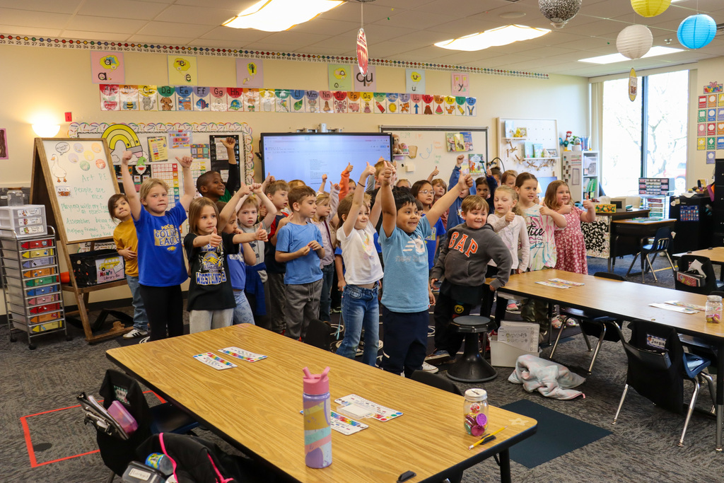 MME kindergarten students and their teachers created a song in honor of Mike Miller Day