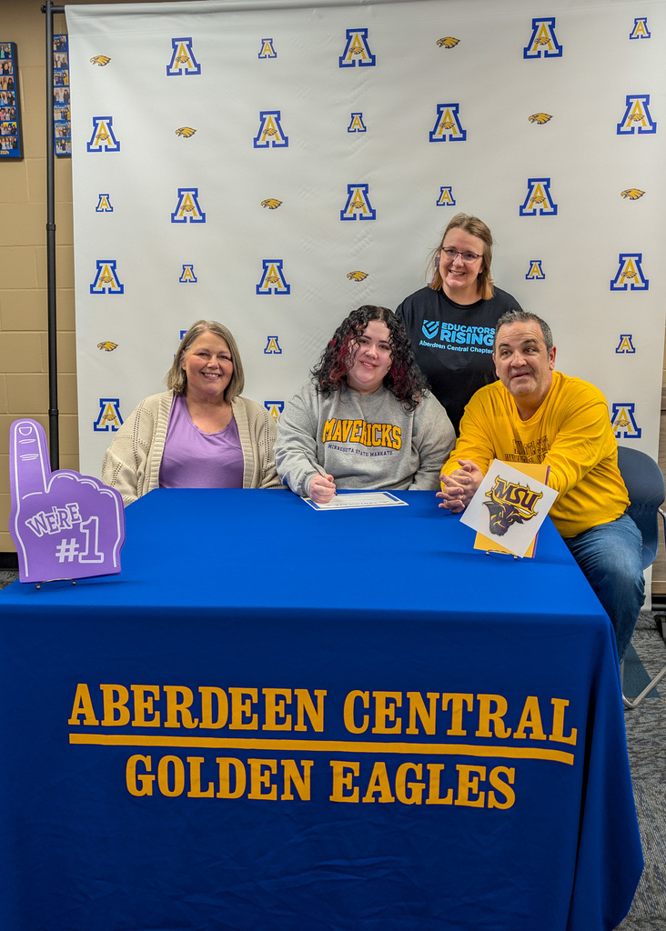 CHS senior Jill Harmel with her parents and Mrs. Ketterling on Teacher Signing Day