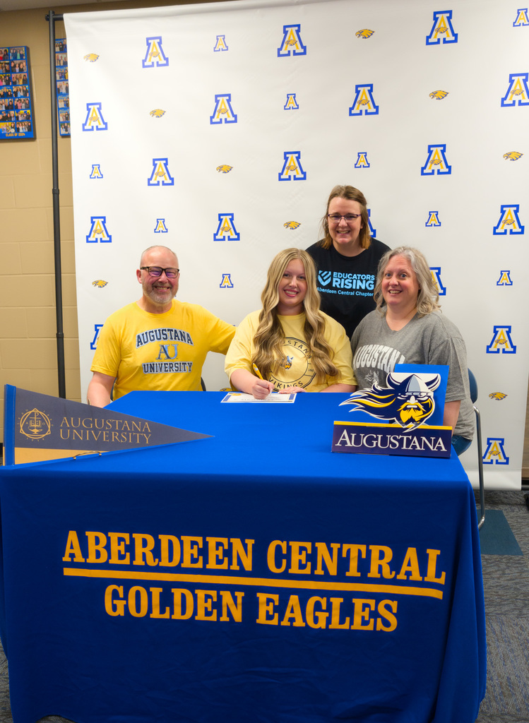 CHS senior Emily Tullar with her parents and Mrs. Ketterling on Teacher Signing Day