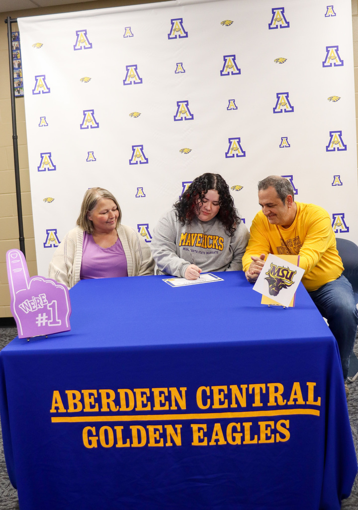 CHS senior Jill Harmel and her parents on Teacher Signing Day