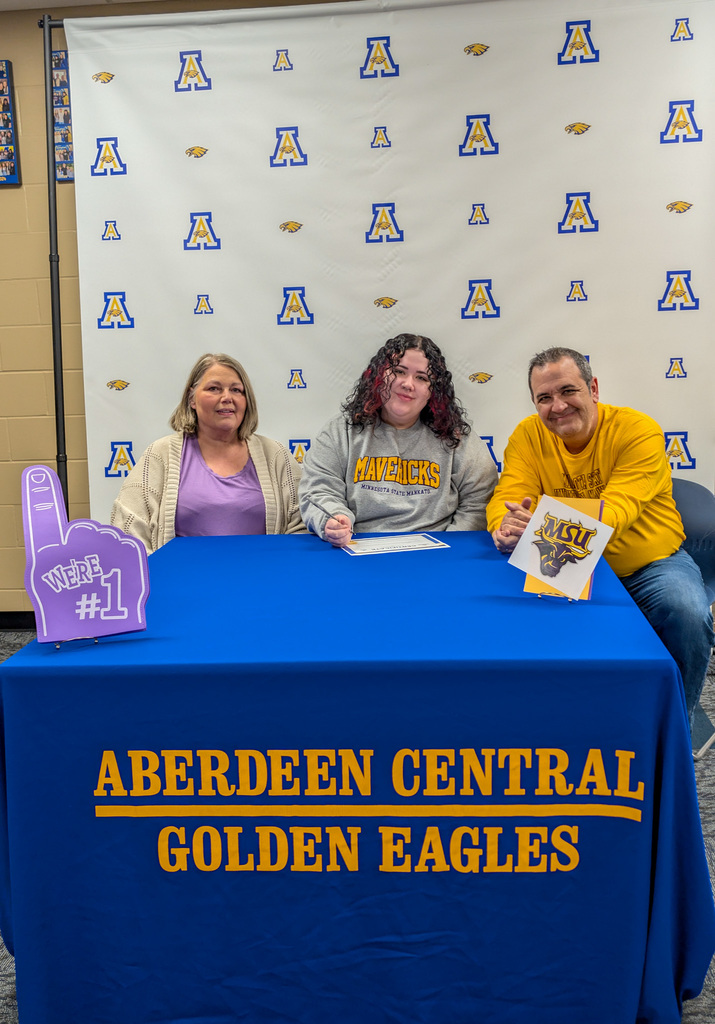 CHS senior Jill Harmel and her parents on Teacher Signing Day