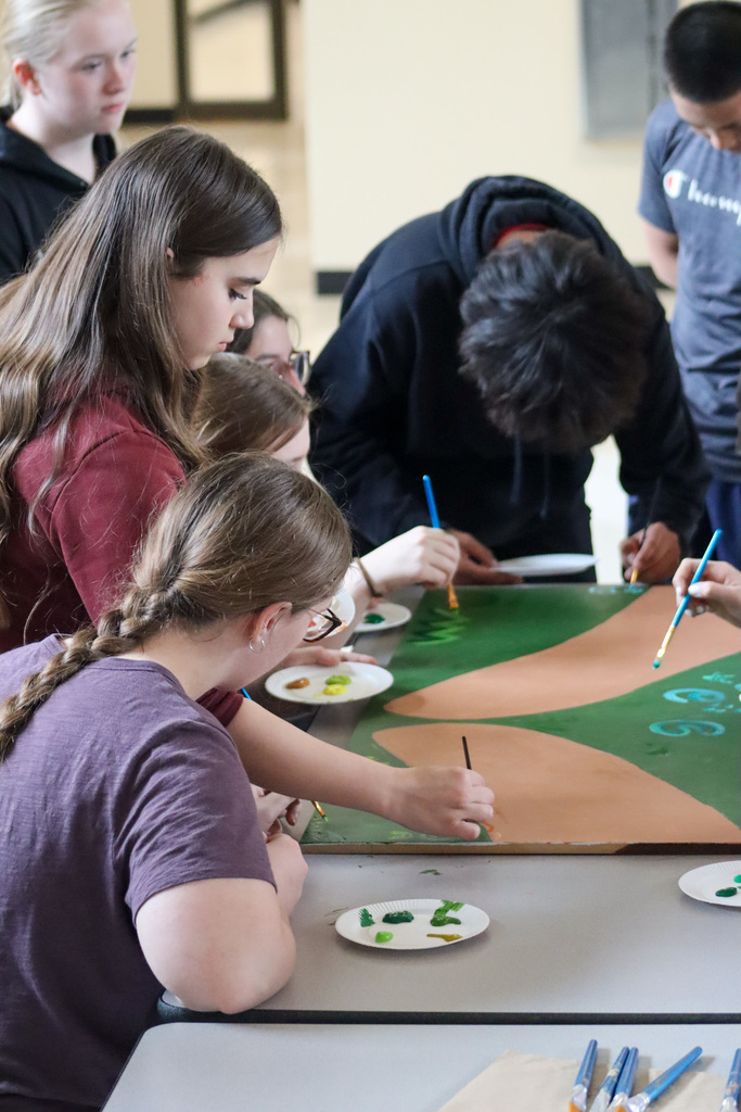 SMS students painting a mural
