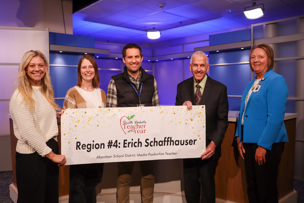 Mr. and Mrs. Schaffhauser and Dr. Guffin with SDDOE representatives