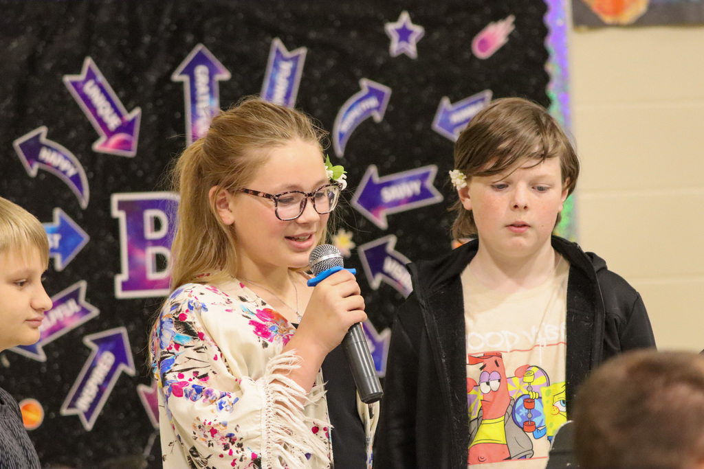Lincoln students speaking at the spring program