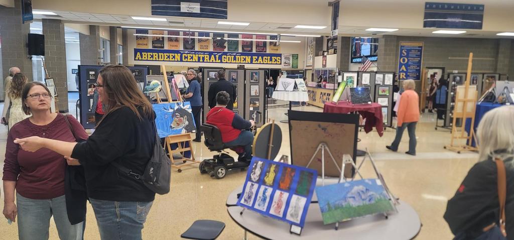Here, community members are enjoying looking at all the artistic talent CHS has to offer!