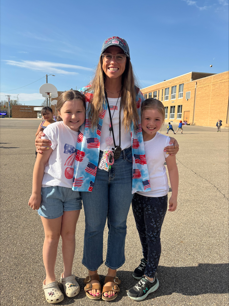 OMT students and teacher wearing red, white and blue at the America 250 Grillout