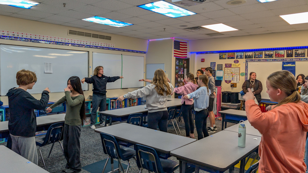 Holgate 8th graders participating in an activity during a presentation about physical therapy