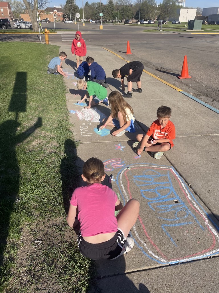May Overby students making patriotic sidewalk chalk art