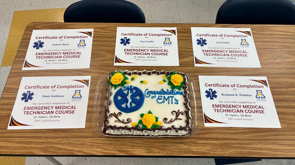 EMT graduates' cake and certificates