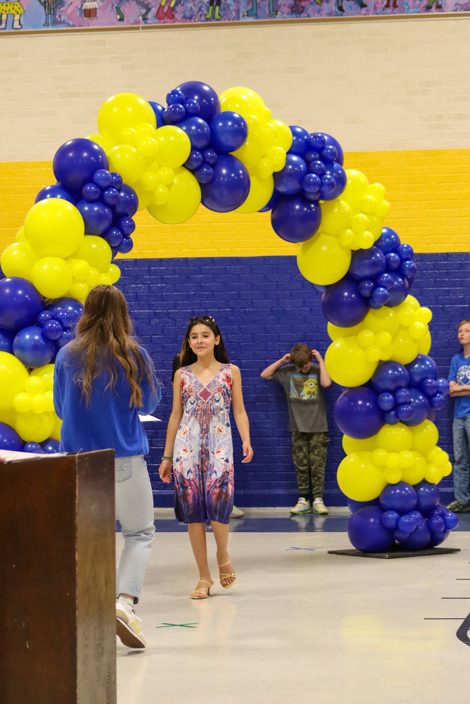 OMT 5th grader getting her certificate from Mrs. Hulscher at the graduation ceremony