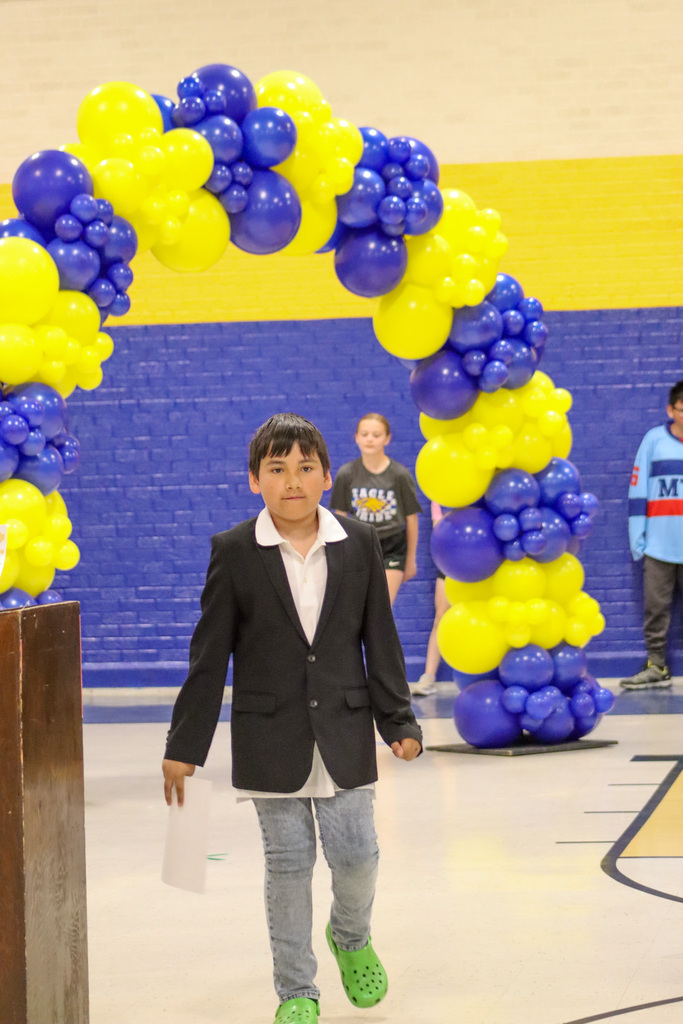OMT 5th grader at the graduation ceremony