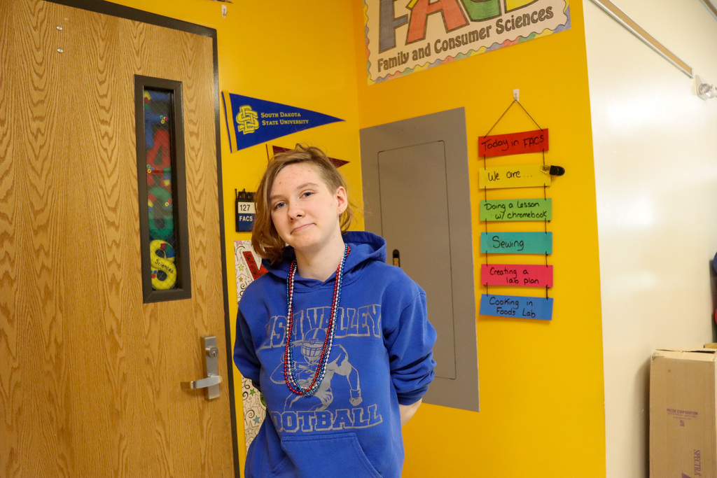 Student dressed in red, white and blue