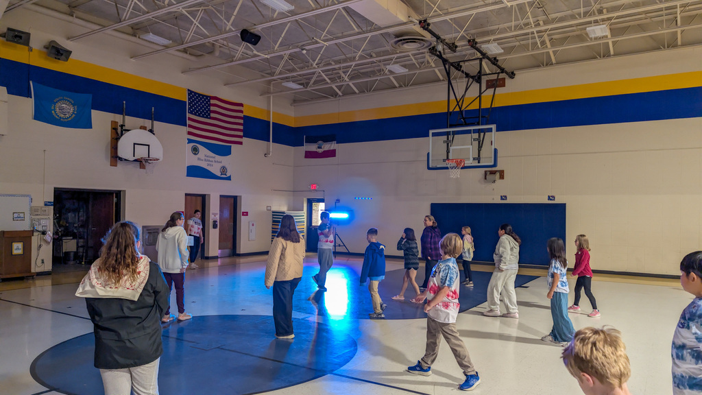 Lincoln students and staff having a dance party in the gym