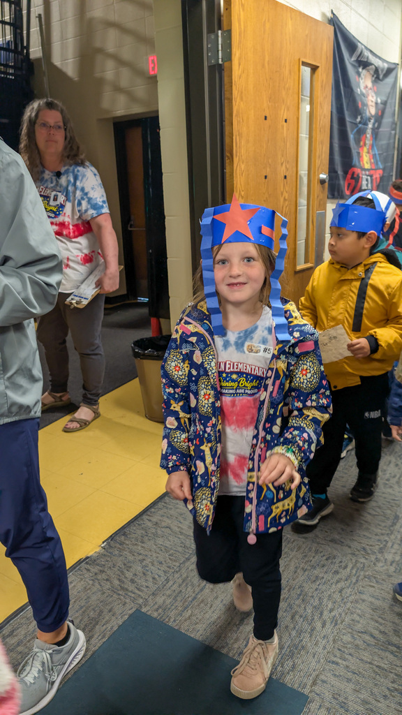 Student wearing her patriotic craft hat