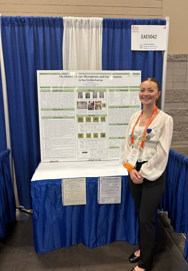 Kaylee Kiesow with her poster