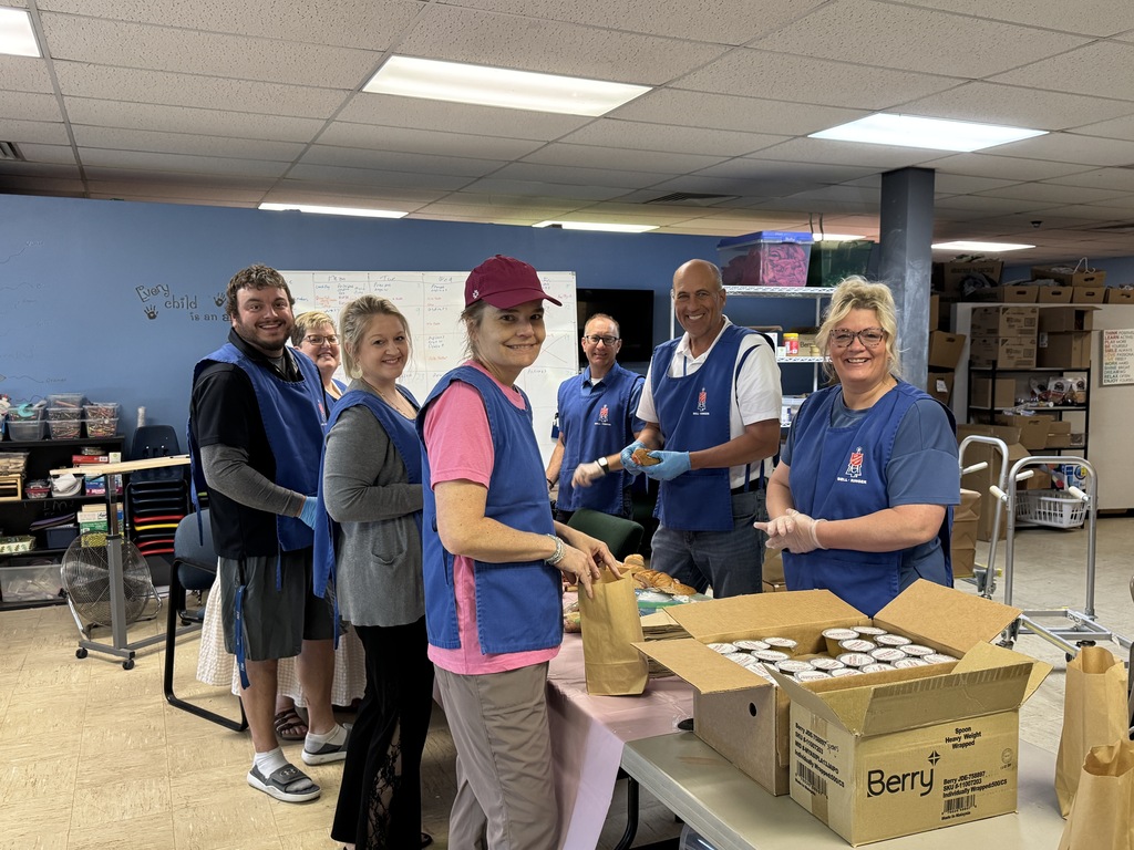 Aberdeen Public Schools administrators volunteering at the Salvation Army