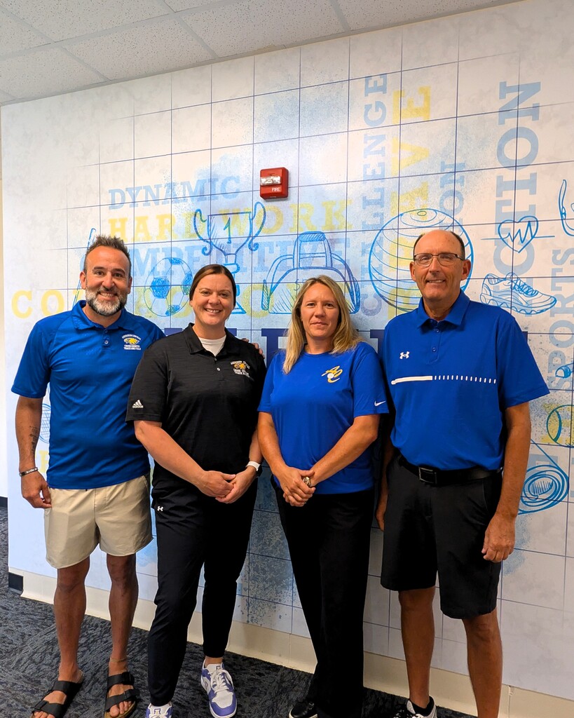Coaches Osborne, Anderson, Daly, and Zimmerman