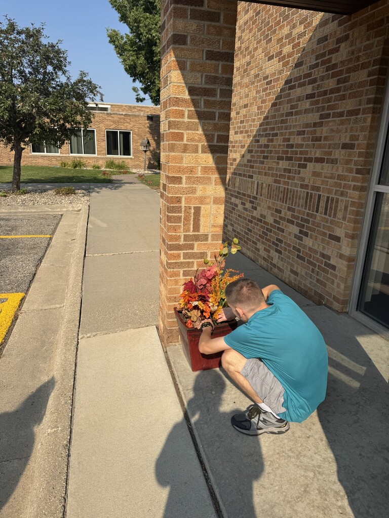 TLC students working on planters at the District Service Center