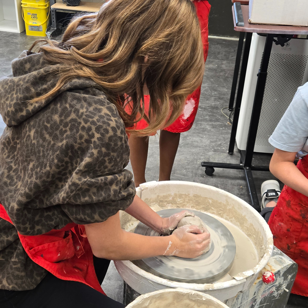 8th grade art is getting messy at Holgate! Students having a blast trying their hand at wheel-thrown pottery!