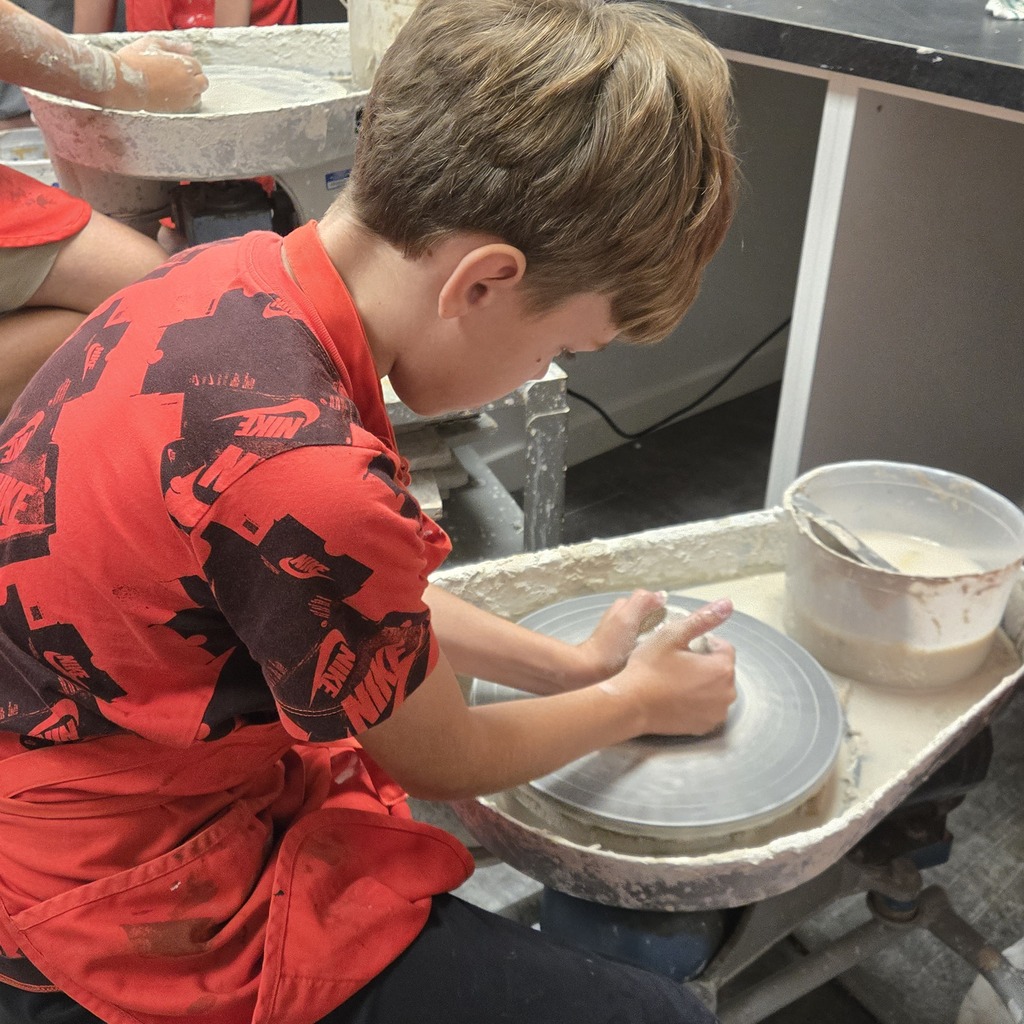 8th grade art is getting messy at Holgate! Students having a blast trying their hand at wheel-thrown pottery!