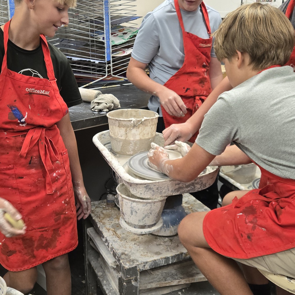 8th grade art is getting messy at Holgate! Students having a blast trying their hand at wheel-thrown pottery!
