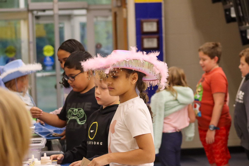 A Simmons Elementary student wearing a cowboy hat