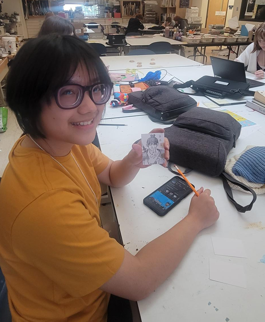 Mika G. finished an original artwork trading card in Art Club!