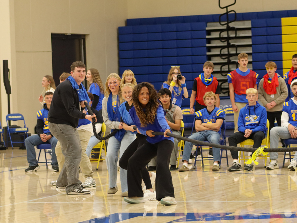 CHS students playing tug of war during the pep rall