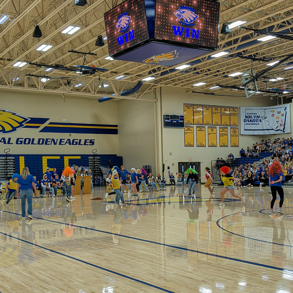 Students participating in a wig game at the pep rally