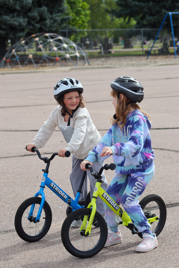 C.C. Lee students riding Strider bikes during gym class