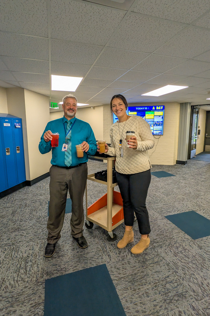 Holgate principals with coffees