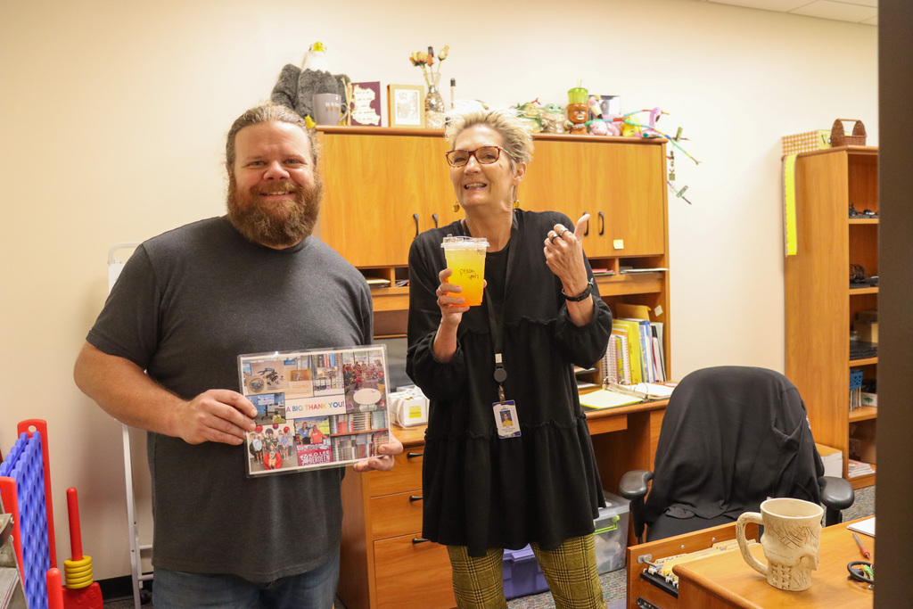 SMS librarian with her coffee and Brodie from The Market