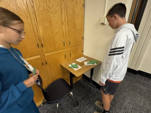 Students made decisions on which shoe(s) they would spend their limited amount of money on. 