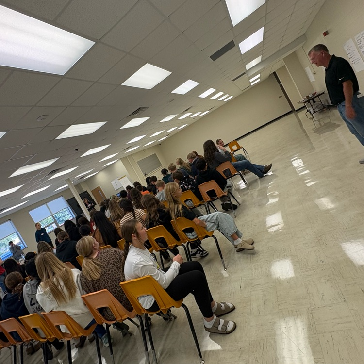 Golden Crew students listening to a presentation