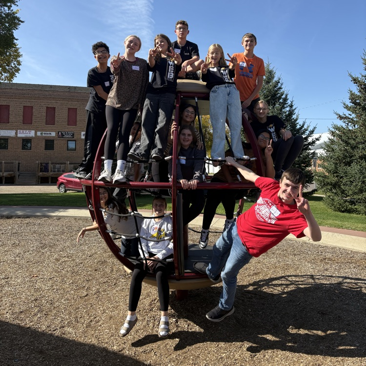 Golden Crew students on playground equipment