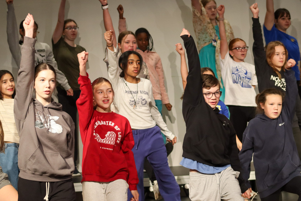 Holgate show choir students rehearsing with choreographer