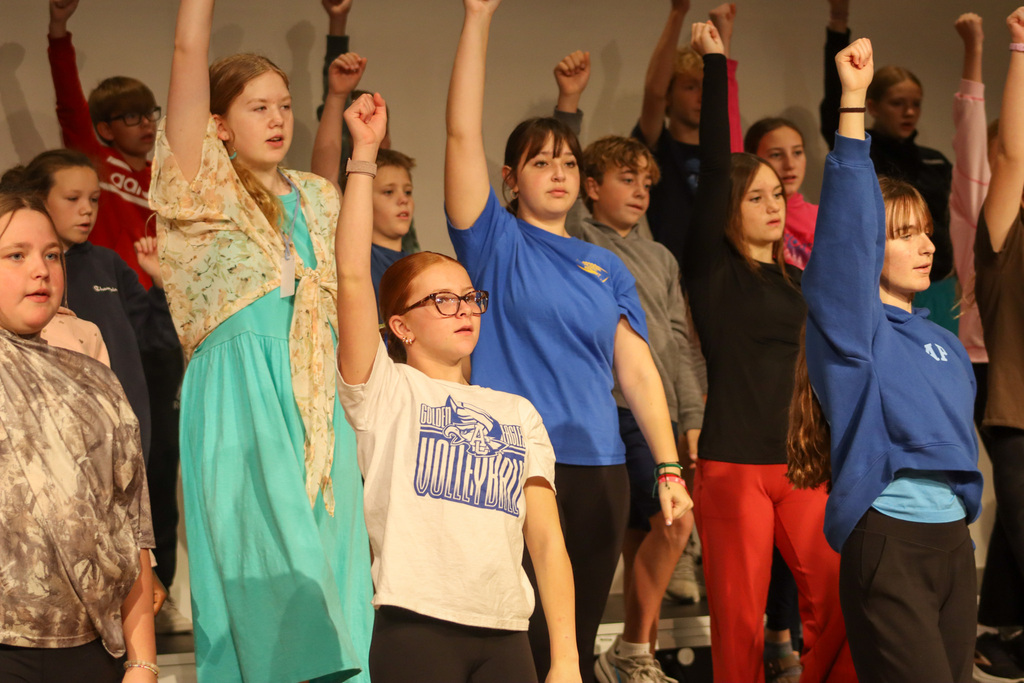 Holgate show choir students rehearsing with choreographer