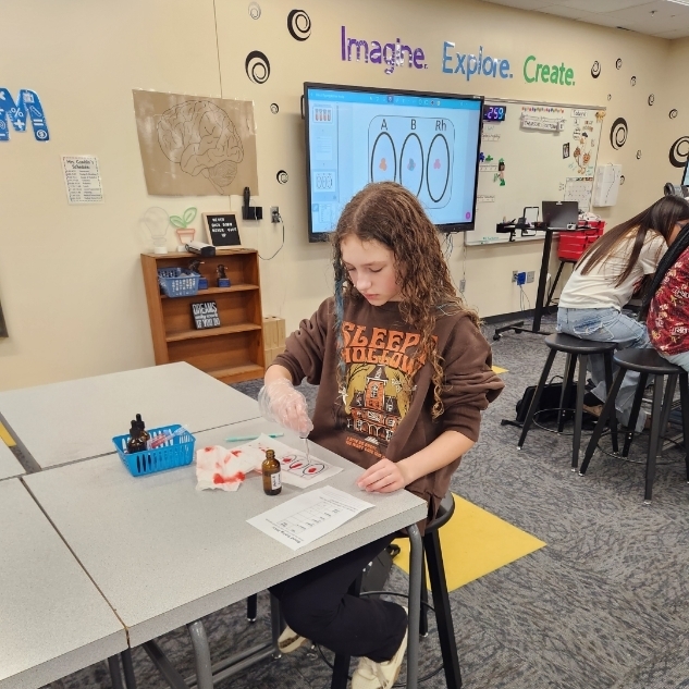 Students learning about blood typing