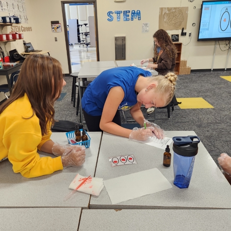 Students learning about blood typing