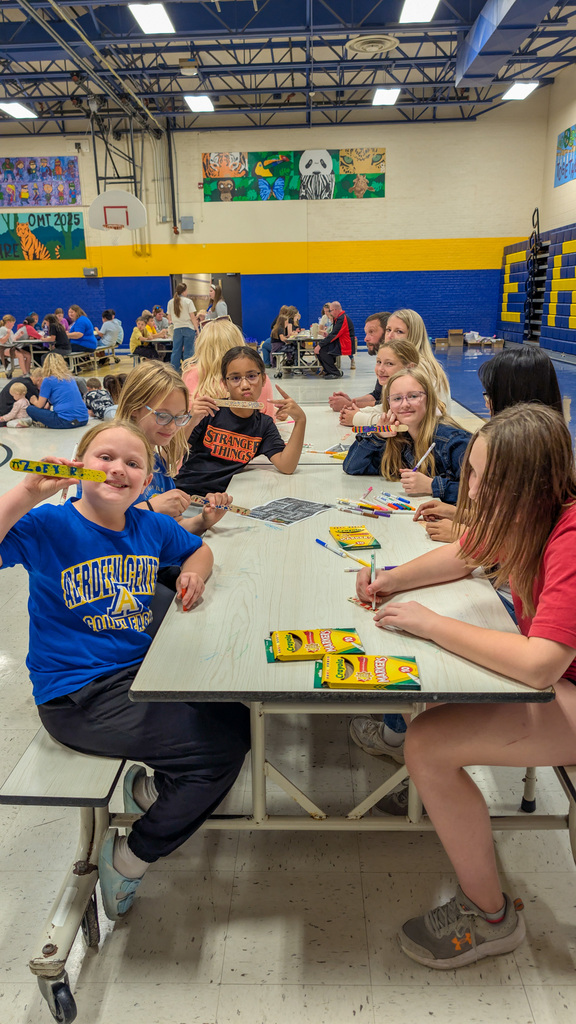 OMT students coloring during the OMT Literacy/STEM Event