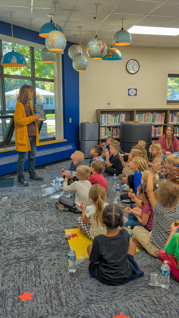 OMT students listening to a story during the OMT Literacy/STEM Event